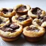 Saftige Zupfkuchen Muffins mit Paradiescreme