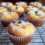 Lemon-Curd-Muffins mit frischem Zitronenfüllung auf einem weißen Teller