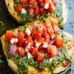 Gebratenes Hähnchen mit aromatischem Pesto auf einem Teller serviert