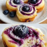 Blaubeer-Käsekuchen-Röllchen auf einem Teller angerichtet