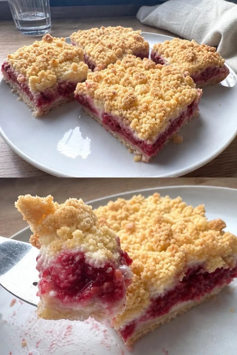 Himbeer-Käsekuchen mit Streusel 1 Himbeer-Käsekuchen mit Streusel auf einem Teller serviert