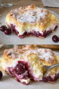 Kirsch-Sahne-Puff-Kuchen auf einem Teller serviert, verziert mit frischen Kirschen