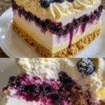 Zitronen-Blaubeer-Kuchen mit Shortbread und Mousse-Anteilung auf einem Teller