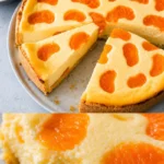 Saftiger Mandarinenkuchen auf einem Teller, dekoriert mit frischen Mandarinen.